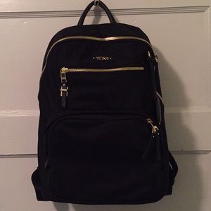 BRAND NEW Tumi travel black with gold backpack